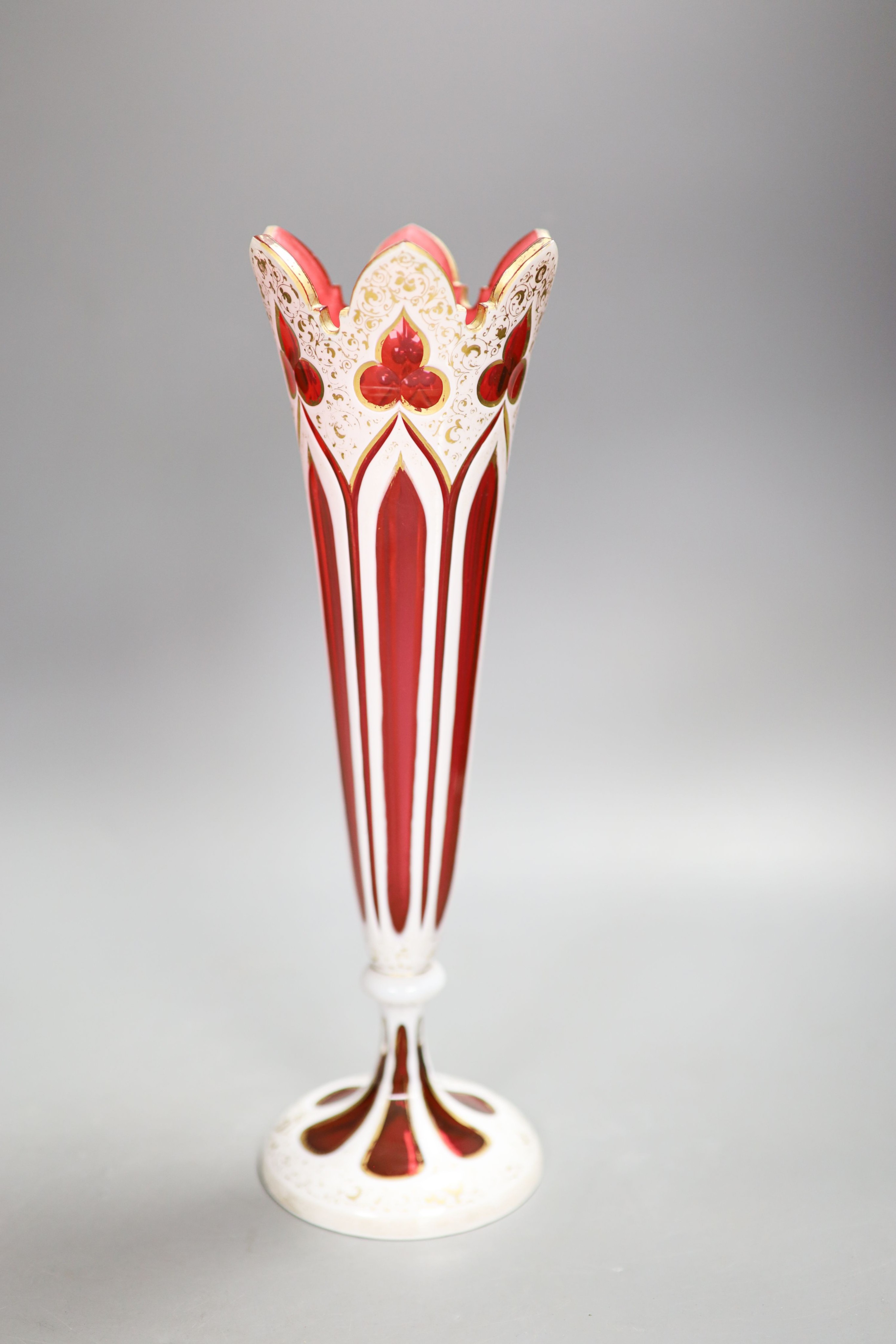 A Bohemian overlaid ruby glass vase, 31cm